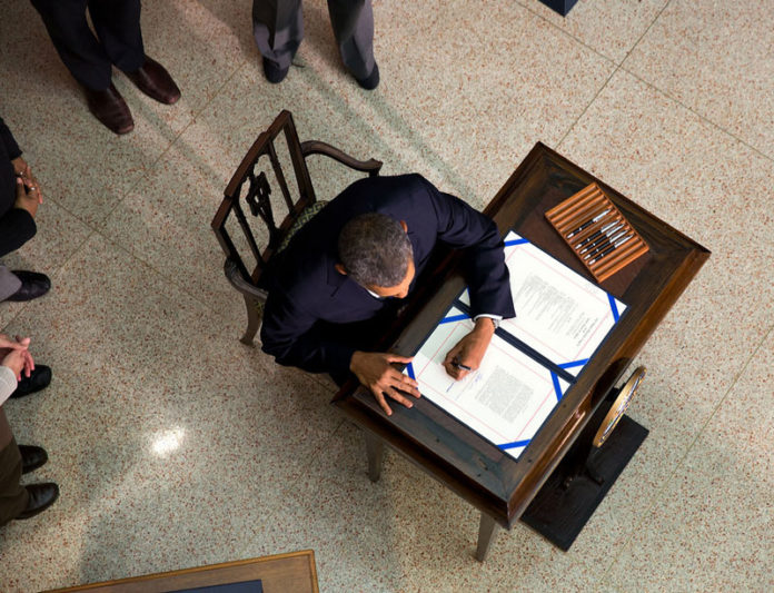 Obama Signing Law