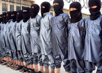 Islamic State Forces Children To Learn Hate By Beheading Dolls children-of-isis